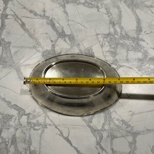 Silver plates dish. 
Craft candles jewelry or just a bowl to catch tiny things.